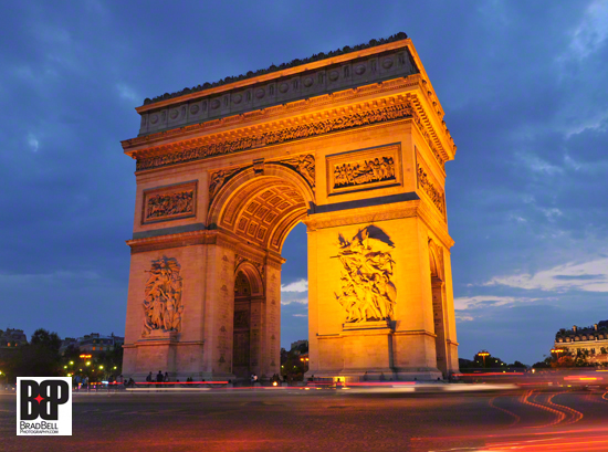 The Arc de Triomphe at twilight.